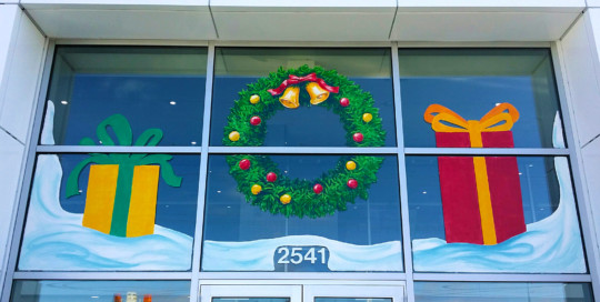 christmas window painting wreath and presents springfield illinois